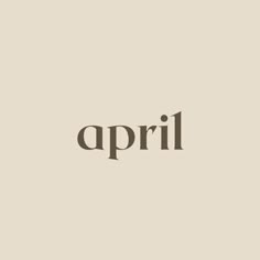 an image of the word april written in black on a beige background with white lettering