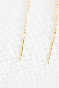 Dainty 14k gold filled versatile ball ear threaders that can be worn multiple ways! Length: 1.2" total threader length Sold as a pair Please note: all earrings are final sale Delicate 14k Gold Filled Linear Earrings For Everyday, Hypoallergenic 14k Gold Threader Earrings For Everyday, Delicate Chain Threader Earrings For Everyday, Delicate Threader Earrings With Chain For Everyday, Delicate Everyday Threader Earrings With Chain, Adjustable Gold Ear Climbers For Everyday, 14k Gold Filled Long Drop Threader Earrings As Gift, Dainty Linear Earrings With Delicate Chain For Gift, Dainty 14k Gold Filled Linear Earrings For Everyday