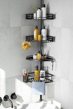 a bathroom with a corner shower shelf next to the bathtub