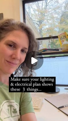 a woman sitting at a desk in front of a computer screen with the words make sure your lighting & electrical plan shows these 3 things