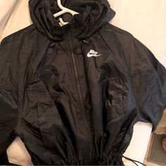 New Women’s Nike Wind Breaker Sporty Black Spring Outerwear, Sporty Black Outerwear For Spring, Nike Black Outerwear For Work, Black Nike Outerwear For Work, Nike Outerwear For Spring Streetwear, Nike Fall Windbreaker For Streetwear, Nike Black Fall Outerwear, Nike Black Outerwear For Spring, Nike Black Outerwear For Fall