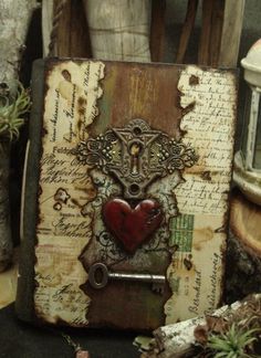 an altered book with hearts on it