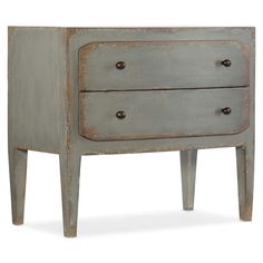 an old grey dresser with two drawers on one side and three knobs on the other