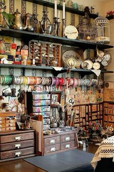 a room filled with lots of different types of items on top of shelving units