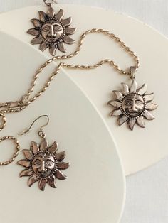 "3 piece 925 Mayan sun pendant, chain, earrings fine detail raised sun face marked 925 measure 1 1/2\" x 1 1/2\" chain marked 925 18\" long in good vintage condition" Vintage Sun Design Jewelry Gift, Sterling Silver Sun Design Jewelry, Spiritual Style Silver Jewelry For Summer, Sterling Silver Jewelry With Sun Design, Gold Jewelry With Sunflower Design For Summer, Summer Gold Jewelry With Sunflower Design, Adjustable Vintage Jewelry With Sun Design, Nickel Free Vintage Summer Jewelry, Elegant Summer Jewelry With Sun Design