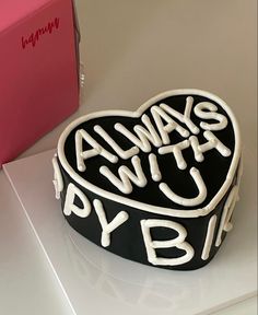 there is a heart shaped cake with the words always witt pyb on it