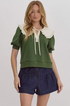 True to size, I am an 8/10 wearing a medium. Solid v-neck top featuring oversized collar. Self-tie at front. Unlined, knit, non-sheer, lightweight. 55% cotton, 45% polyester. Small 4-6Medium 8-10Large 12-14 Swim Jewelry, Green Jersey, Oversized Collar, Pan Collar, Jersey Top, Peter Pan Collar, White Collar, V Neck Tops, Peter Pan