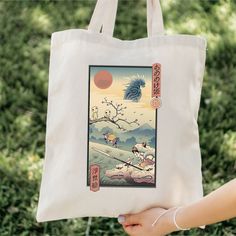 "Our Princess Mononoke inspired 100% cotton bag comes in one size - 15\" x 16\"- perfect for everyday wear. While the canvas material will show off your designs in great colors, it's durable and will last for years. The bag features 20\" handles (made from the same canvas), making it easy to carry even with a week's worth of shopping in Ghibli inspired style! .: 100% cotton canvas .: Heavy fabric (12 oz/yd² (406.9 g/m .: Sewn-in label" Retro Cotton Canvas Travel Bag, Travel Cotton Shoulder Bag With Graphic Print, Retro Canvas Bag As A Gift, Retro Cotton Canvas Bag For Daily Use, Cotton Bags With Graphic Print For Daily Use, Retro Cotton Bag With Graphic Print, Retro Cotton Bags With Graphic Print, Retro Cotton Bag As Gift, Cotton Shoulder Bag With Graphic Print