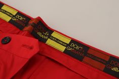 Dolce & Gabbana Gorgeous brand new with tags, 100% Authentic DOLCE & GABBANA mens pants. Model: Trousers chinos pants Fit: Slim Fit Color: Red Two front and two back pockets Zipper fly closure Logo details Made in Italy Material: 100% Cotton Designer Straight Leg Pants With Pockets, Luxury Red Fitted Bottoms, Designer Summer Workwear Bottoms, Luxury Fitted Red Bottoms, Luxury Cotton Pants, Designer Workwear Bottoms With Pockets, Red Slim Fit Cotton Chinos, Fitted Red Cotton Chinos, Luxury Cotton Workwear Bottoms