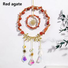 About this product ✧ ARTISTIC DESIGN - Our Round Pendant Suncatcher Hanging is expertly crafted with natural gemstone, crystal and metal chains, designed with intricate details that enhance its beauty and charm. The high-quality crystals that are chosen for their ability to reflect and refract light, creating a mesmerizing display of colors and patterns. ✧ GREAT DECORATION - Our Round Pendant Suncatcher Hanging can be hung on your home window, garden, curtain, balcony, doorway, wall, chandelier, etc, When these high-quality crystals are in direct sunlight they cast thousands of beautiful rainbows onto your room walls. It will perfectly fill the blank in any room. ✧ PERFECT GIFT - This unique and heartfelt product makes a sentimental surprise for your friends, families, girlfriend, loved on Curtain Balcony, Wall Chandelier, Window Garden, Sensory Tools, Home Window, Red Agate, Beautiful Rainbow, Red Jasper, Crystal Gifts