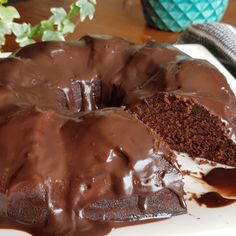 a chocolate cake with one slice cut out