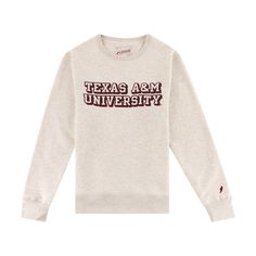 Oatmeal colored sweatshirt with Texas A&M University outlined in maroon. Collegiate Sweatshirt With Embroidered Logo For Fall, Collegiate Relaxed Fit Sweatshirt For Fall, Collegiate Crew Sweatshirt For Fall, Collegiate Hoodie With Relaxed Fit For Fall, Collegiate Fall Hoodie Relaxed Fit, Logo Print Sweatshirt For Campus In Fall, College Logo Print Sweatshirt For Fall, Fall Campus Sweatshirt With Lettering, Fall College Sweatshirt With Logo Print