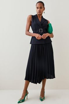 This Dress Is The Epitome Of Modern Elegance. Beautifully Tailored Using A Recycled Polyester Blend, The Piece Gently Defines Your Figure Using Expertly Placed Panelling And A Metal-Trimmed Waist-Cinching Belt. Forming The Appearance Of Sleek Separates, The Waistcoat-Style Bodice Is Layered Over A Pleated Skirt That Falls Gracefully At The Ankle. Finish With Monochrome Accessories For A Deniably Striking Occasionwear Look.Style: Midi Dressdesign: Plainfabric: Wovenlength: Midineckline: Collareds Elegant Sleeveless Belted Dress, Elegant Sleeveless Midi Dress With Fitted Waist, Elegant Sleeveless Belted Dress For Formal Occasions, Chic Pleated Dress With Fitted Waist, Elegant Party Dress With Belt Detail, Formal Pleated Midi Dress With Fitted Waist, Elegant Pleated Midi Dress For Office, Elegant Pleated Midi Dress For Work, Sleeveless Formal Dress With Belt Detail