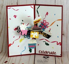 a handmade birthday card with cupcakes and confetti on the side