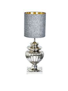 a silver table lamp with a grey shade on it's base and a gold trim around the top