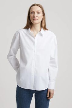 Oversized Classic Cotton Blouse, Classic Oversized Cotton Blouse, White Relaxed Fit Cotton Dress Shirt, Timeless Relaxed Fit Button-up Shirt, Relaxed Fit Collared Poplin Shirt, White Relaxed Fit Poplin Shirt, Classic Oversized Tops For Everyday, White Oversized Poplin Shirt, Timeless White Relaxed Fit Top