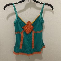 It's Perfect For Teens Green Cotton Camisole, Fitted Green Vest Top, Orange Stretch Tank Top, Orange Camisole Tank Top For Spring, Fitted Green Cotton Tank Top, Fitted Orange Camisole For Summer, Green Cotton Tank Camisole, Green Cotton Vest Top, Orange Sleeveless Cotton Tank Top