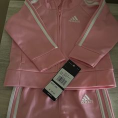 Infant Girls Adidas Sweatsuit Size 6 Months Light Pink Fitted Long Sleeve Sets For Playwear, Fitted Long Sleeve Playwear Sets, Fitted Pink Sportswear Tracksuit, Pink Fitted Tracksuit For Sports, Fitted Pink Tracksuit For Sports, Sporty Pink Long Sleeve Sets, Adidas Pink Playwear Sets, Adidas Pink Long Sleeve Sets, Pink Winter Sports Sets