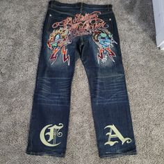 Reposhing This Item I Purchased From @Shopping_g. Loved It, But Ready To Rotate For Something New. Questions? Leave A Comment Below! Christian Audigier Jeans, Graphic Jeans, Christian Audigier, Jeans Y2k, Cute Simple Outfits, Simple Outfits, Leave A Comment, Something New, Mens Jeans