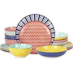 an assortment of colorful plates and bowls