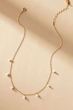 Doting dainty pearls, this cable chain offers a beautiful accent to your look. Gold And Pearl Jewelry, Keshi Pearl Bracelet, Keshi Pearl Earrings, Anthropologie Earrings, Stone Necklace Set, Crystal Anklet, Crystal Chandelier Earrings, Swarovski Bracelet, Back Necklace