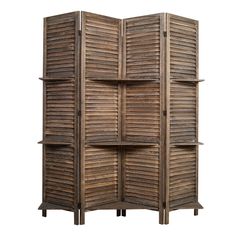 an old wooden room divider with shutters on the sides and shelves below it