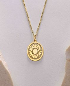 Gold Sunflower Flower Pendant - Sunflower Flower Gold Necklace ● Material of pendant: Solid Gold 14k ( REAL GOLD ) ● Metal Stamp: 14k ( REAL GOLD ) ● The pendant is available in 5sizes: - 12x17 mm / 0,47 x 0,66 inches - 13x18 mm / 0,51 x 0,70 inches  In the photos - 14x19 mm / 0,55 x 0,74 inches  - 16x21 mm / 0,62 x 0,82 inches  - 18x24 mm / 0,70 x 0,94 inches ( In the photos the size is 13x18 mm / 0,51 x 0,70 inches ) ( Jump Ring inner diameter: 4 mm ) ● Material of chain: Solid gold 14k ( REAL Yellow Gold Jewelry With Sunflower Design As Gift, Anniversary Gold Jewelry With Sunflower Design, Yellow Gold Oval Birth Flower Jewelry, Engraved Yellow Gold Flower Necklace, Elegant Round Sunflower Design Necklace, Engraved Yellow Gold Flower-shaped Necklace, Sunflower Pendant Necklace, Sunflower Pendant Gold, Silver Necklace With Sunflower Pendant