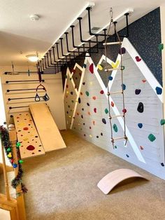 an indoor climbing wall in a child's playroom