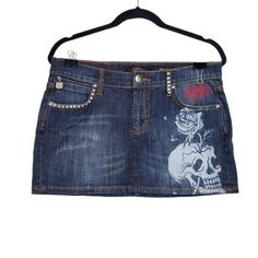 Ed Hardy Womens Rose Skull Print Studded Y2k Denim Mini Skirt Size 30 Ed Hardy Rose Skull Print Studded Y2k Denim Mini Skirt In Blue. Pockets And Belt Loops. Skull Rose Print. Logo Patch On Back. No Stains Or Holes. Casual Y2k Denim Mini Skirt. Size: 30 Length: 12" Waist: 16.5" Condition: Pre-Owned, Excellent Box B K/15/13pmed Rock Style Fitted Denim Bottoms, Fitted Rock Style Denim Bottoms, Fitted Denim Rock Bottoms, Rock Style Denim Bottoms For Streetwear, Denim Rock Bottoms For Streetwear, Rose Skull, Jean Mini Skirts, Y2k Denim, Embellished Denim