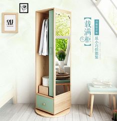 an open cabinet with clothes hanging on it in a room next to a table and stairs