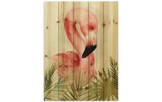 a pink flamingo painted on wood with palm leaves