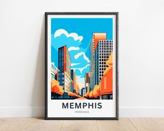 a framed poster with the words memphis in front of a cityscape