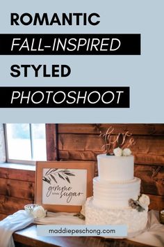 a white wedding cake sitting on top of a table next to a sign that says romantic fall - inspired styled photoshoot