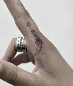 Girly Hand Tattoos For Women, Idea Tattoo For Women, Shooter Tattoo, Knuckle Tattoo Ideas, Fun Girly Tattoos, Tattoos For Electricians, Knife Finger Tattoo, Jayden Tattoo, Small Hunting Tattoos