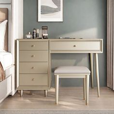 a bedroom scene with focus on the dressing table and stool, along with a bed