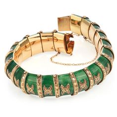 Be amazed by this vintage 1930's green Enamel 18K Yellow Gold flexible snake Bracelet. The green Paillonne enamel shine with every movement.Elegant Hand-carved engraving of the gold detailing enhances this bracelet’s eye-catching effect. For security, this 79.2-gram bracelet has two two safety clasp for securing.Measurements: 17 mm width X 7.0 InchesWeight: 98.2 GramsClasp: Insert ClaspCondition: ExcellentAccompanied by an official appraisal document. Luxury Vintage Green Cuff Bracelet, Green Enamel Bangle, Elegant Green Engraved Bracelets, Elegant Green Engraved Bracelet, Snake Green, Two Two, 18k Gold Bracelet, Yellow Gold Wedding Band, Jewelry Appraisal