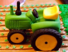 a cake decorated to look like a tractor