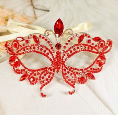 FAST & FREE SHIPPING DURABLE QUALITY: This Crystal Masquerade Mask is made of high-quality alloy and rhinestone diamond. They are manual workmanship, very comfortable to wear. ELEGANT DESIGN: The masquerade mask is encrusted shinny diamond rhinestone and crystal. The intricate and delicate are very glamorous, elegant and luxury. PRINCESS STYLE: You will be the center of attraction at party when you wear the princess style fancy mask. VARIOUS OCCASION: The masks are perfect for Masquerade party, Mardi Gras Prom, Red Masquerade Mask, Red Masquerade, Fancy Mask, Costume Masquerade, Masquerade Ball Party, Prom Fashion, Gold Eye Mask, Carnival Themed Party