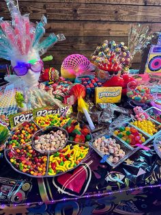 a table topped with lots of candy and candies