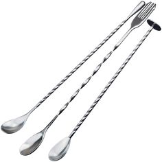 three forks and two spoons on a white background