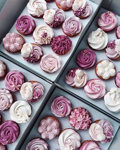 two boxes filled with pink and white cupcakes on top of each other's sides