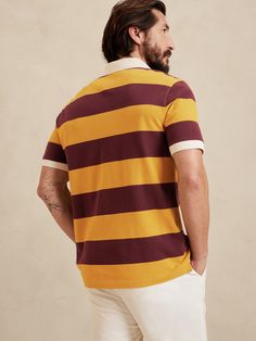 A classic polo with bold stripes and embroidered BR logo, this style staple is crafted from sumptuous, certified-organic cotton to add a little softness wherever your day leads.  ORGANIC: Made with certified, organically grown cotton that's easier on Br Logo, Bold Stripes, Pique Polo Shirt, Polo Collar, Men's Polo Shirt, Polo Ralph Lauren, Polo Shirt, Organic Cotton, Stripes