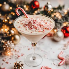 a christmas drink with candy canes and candies