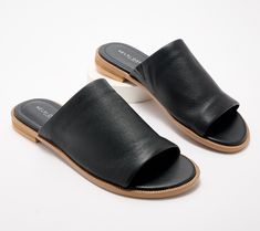 Slide these genuine leather sandals right into your cart! Their modern, minimalistic design makes them your go-to shoe for pairing with everything in your sunny-season closet. From Kelsi Dagger. Classic Footbed Sandals For Summer Vacation, Classic Summer Footbed Sandals For Vacation, Classic Everyday Slip-on Sandals, Classic Slip-on Sandals For Everyday, Classic Flat Footbed Sandals For Spring, Modern Flat Sandals For Spring, Everyday Leather Sandals With Removable Insole, Classic Slide Footbed Sandals For Spring, Everyday Mules With Leather Footbed For Spring