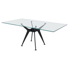 a glass table with black metal legs