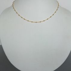 A Gold plated sterling silver rolo neck chain with balls.Dimensions: 0.7 mm    Balls: 2.5mmLength: 16-17 inches    Weight: 2.9 gmThis necklace is made of 925 hypoallergenic sterling silver plated with gold. Most of my pieces come with a 925 stamp.Please go through all the pictures posted for this item to gauge the actual size.Can be packaged in a gift box. I can include a personal message from you if needed_______________________________________You are welcome to contact me at...   bhavnakwintra Ball Chain Choker Jewelry As Gift, Ball Chain Choker Jewelry Gift, Ball Chain Choker As A Gift, Gift Ball Chain Choker Jewelry, Minimalist Ball Chain Jewelry Gift, Gold Beads Chain, Multiple Ear Piercings, Beads Chain, Neck Chain