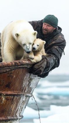 a man holding two polar bears on top of a boat