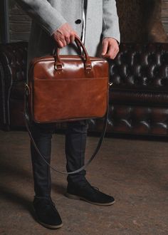 "The leather brown briefcase for men, from ShLeatherBags, with simple, modern lines and timeless design features. The main spacious compartment has padding to better secure and protect your laptop and documents. Our messenger bag includes a removable shoulder strap and carrying handles for comfortable transportation. This minimalist briefcase is suitable for men and women. Ideal for work! EXTERIOR: - Genuine leather - Two handles - One shoulder removable belt - Large back pocket for magazines, n Mens Leather Bag Work Men's Briefcase, Men Work Bag, Laptop Bags For Men Style, Leather Laptop Bag For Men, Brown Briefcase, Brown Leather Laptop Bag, Mens Leather Laptop Bag, Leather Office Bags, Office Bags For Men