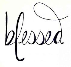 the word blessing written in cursive ink