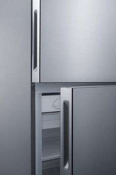 a stainless steel refrigerator with its door open